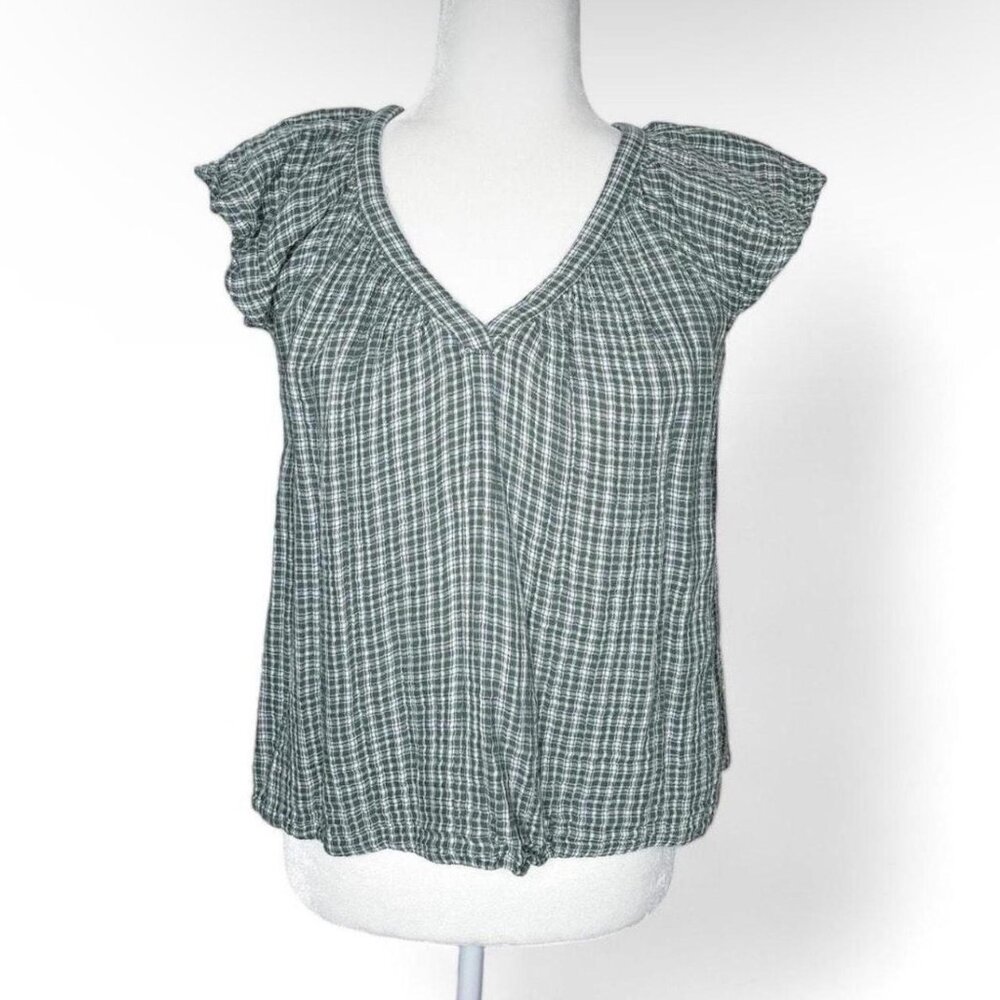 Green and white plaid blouse with ruffled sleeves